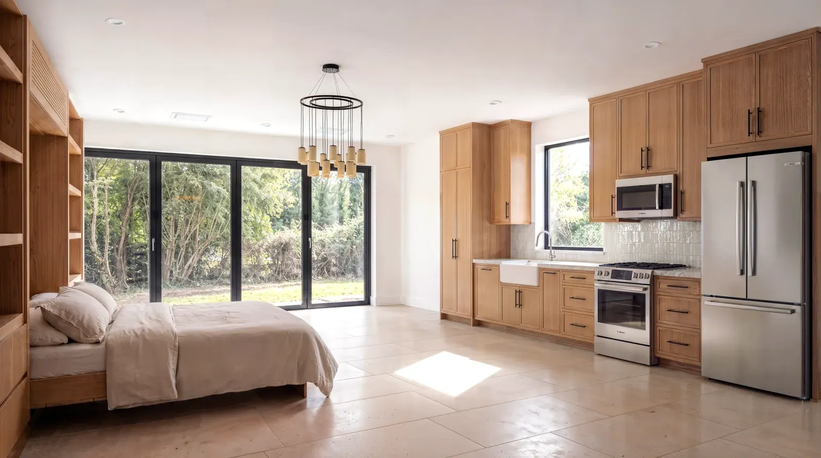 Garage conversion in Tarrytown, Austin, TX with white oak cabinetry and black-framed glass doors