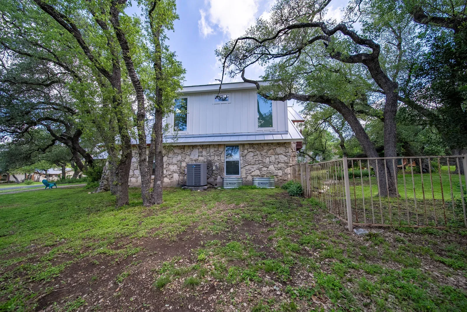 After: the Oak Hill home with its completed second-story dormer addition